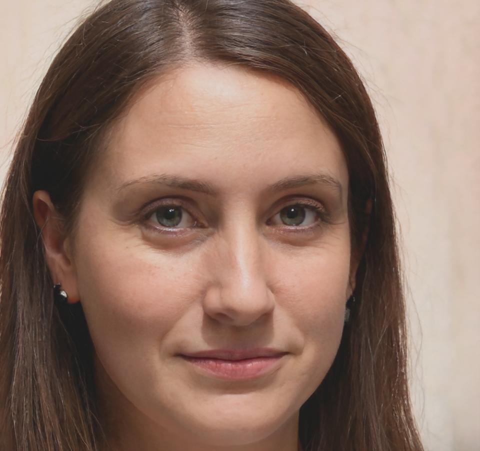 Professional headshot of River Chen